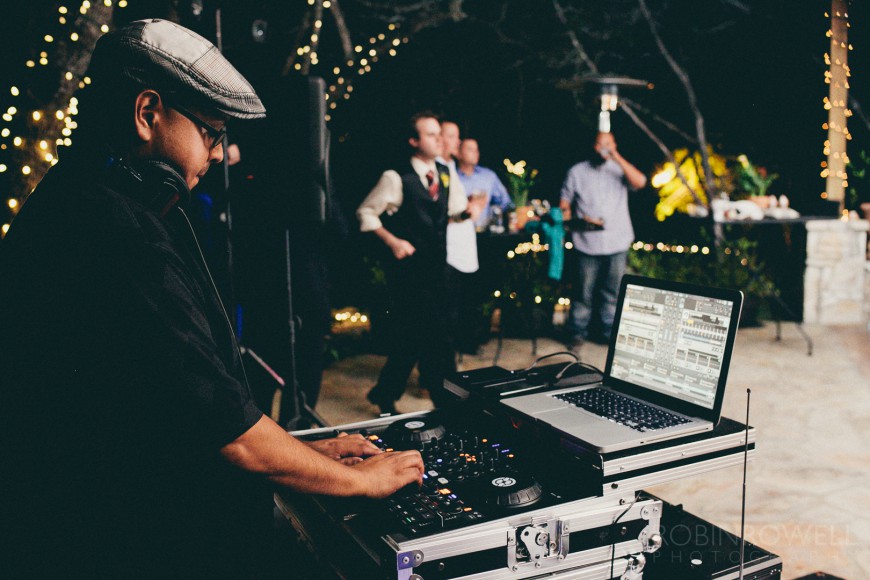 The DJ plays for the wedding guests