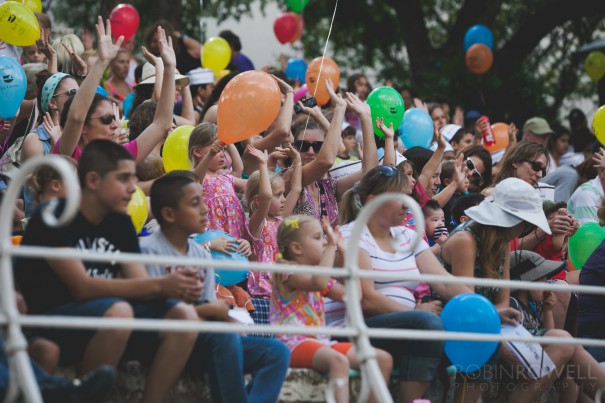Children interact with the storytelling at the Austin Symphony Orchestra "Children's Art Park"