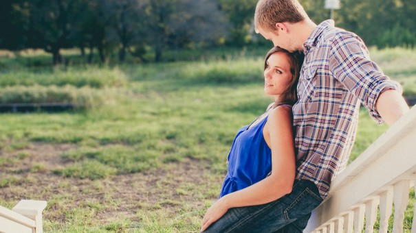 A country style engagement photo with Aubrey leaning back on Boone - Leander TX
