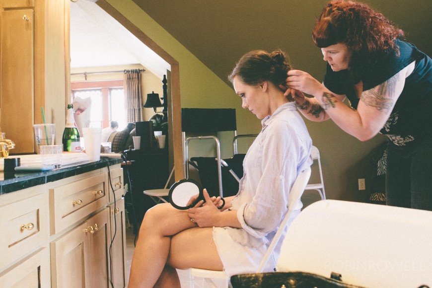 The bride gets her hair styled - ranch style wedding in Leander, TX