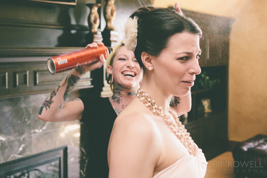 A bridesmaid isn't a big fan of all the hairspray - ranch style wedding in Leander, TX