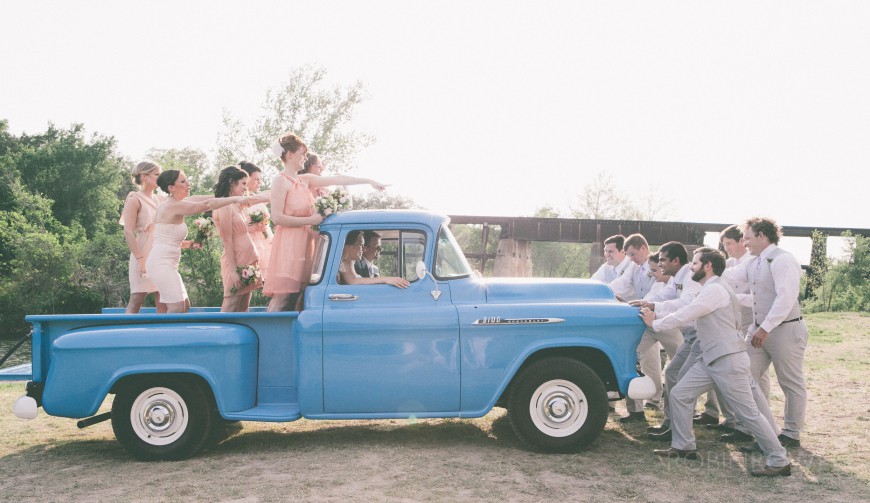 The bridesmaids command the grooms to move forward - ranch style wedding in Leander, TX