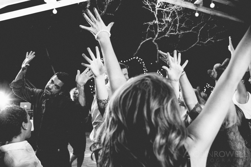 Hands in the air as the ladies dance at the wedding reception