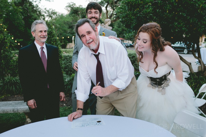 The signing of the marriage certificate at Laguna Gloria - Austin, TX
