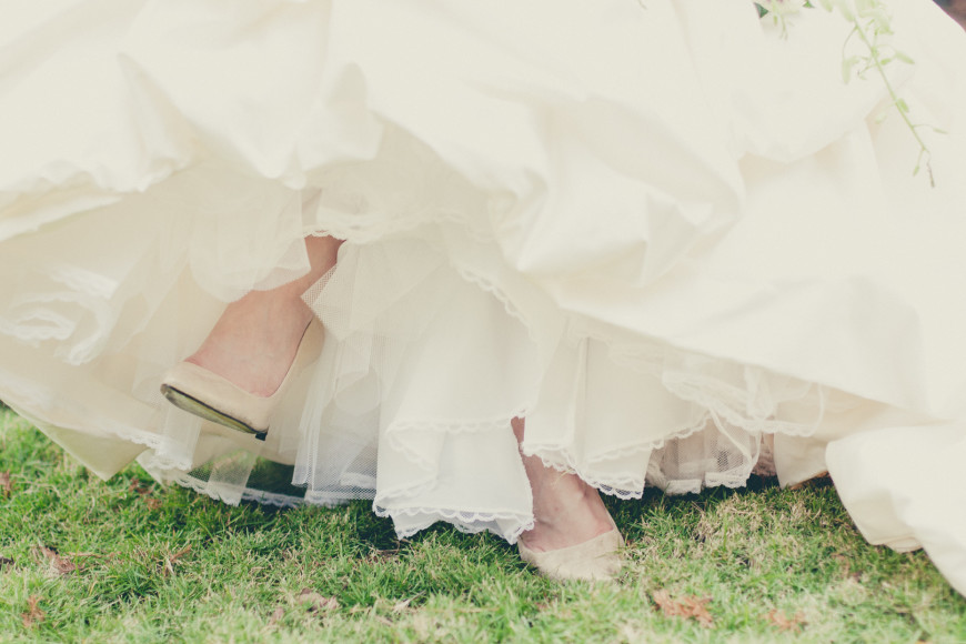 A detail photo of the bride's shoes at The Woodlands United Methodist Church