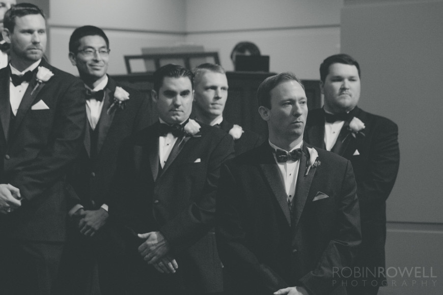 The groom and groomsmen get their first look at the bride at The Woodlands United Methodist Church