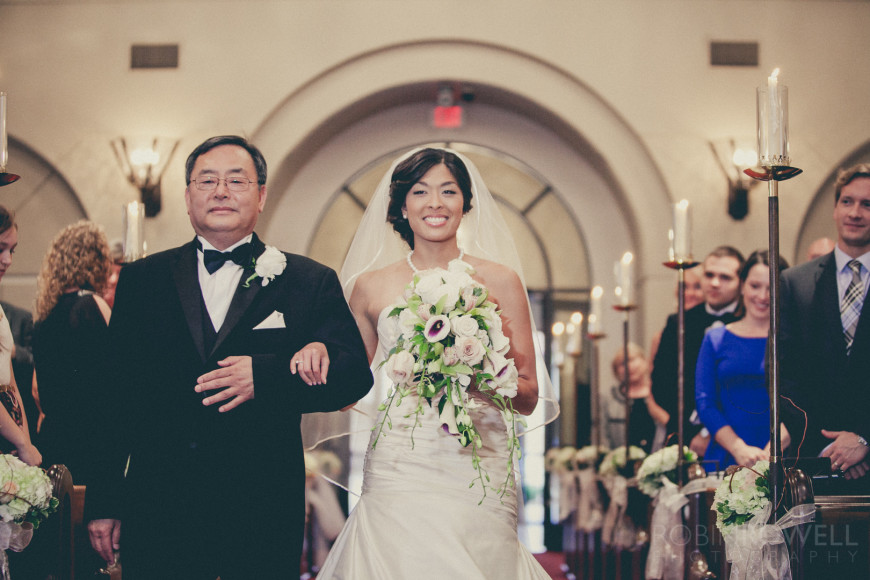A proud bride with her father at The Woodlands United Methodist Church