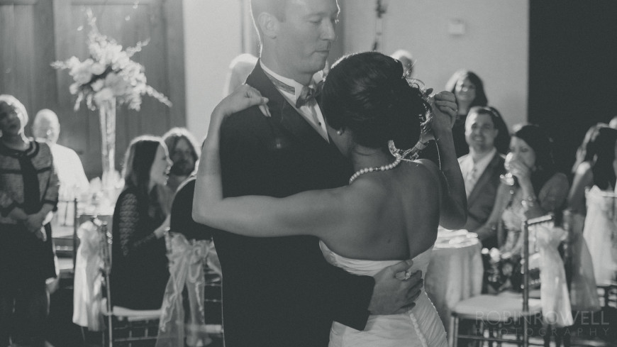 A black and white of their first dance at The Woodlands Country Club - Palmer Course