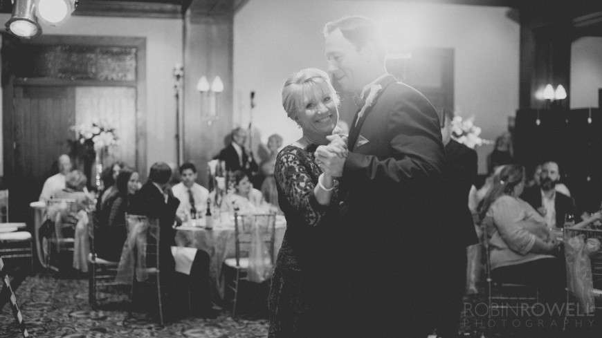 A bw photo of the groom dancing with his mother at The Woodlands Country Club - Palmer Course